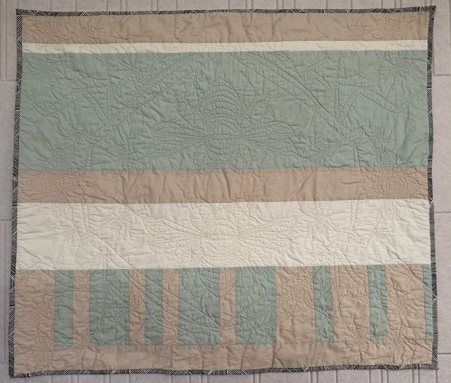 Striped Vera Baby Quilt with Garden Bug Stitches