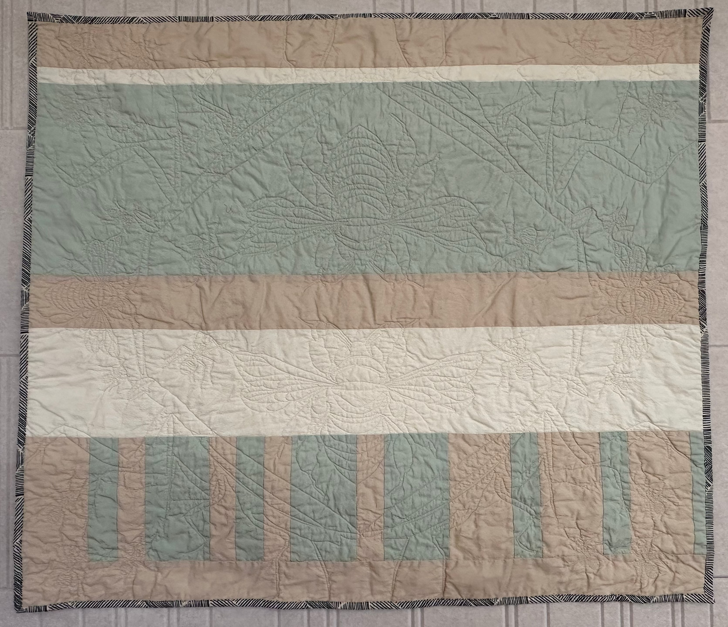 Striped Vera Baby Quilt with Garden Bug Stitches