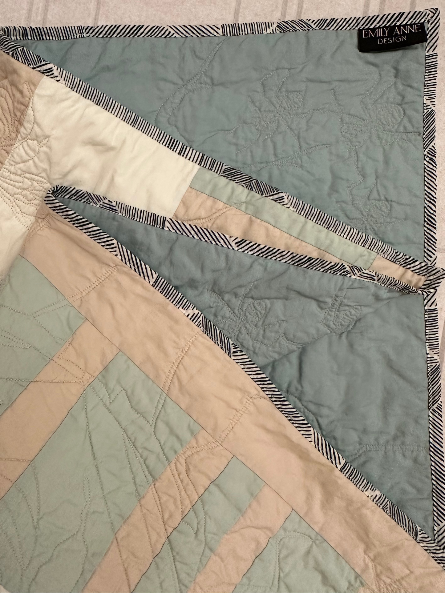 Striped Vera Baby Quilt with Garden Bug Stitches