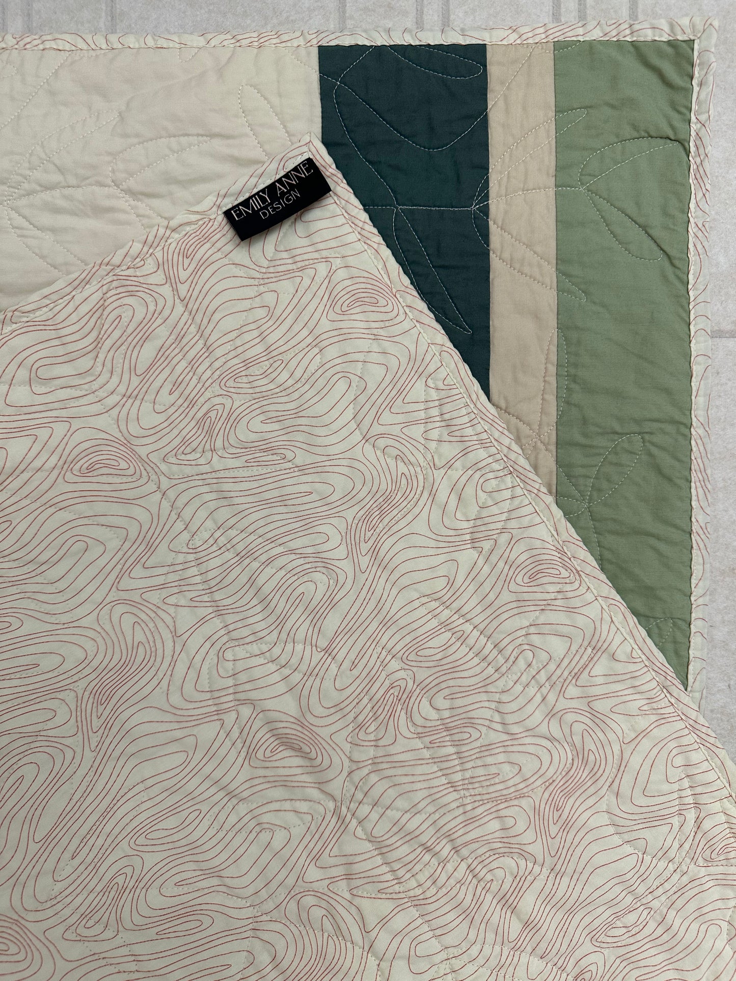 Green and Cream Striped Baby Quilt