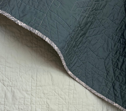Fox Stitch Shades of Green Whole Cloth Baby Quilt