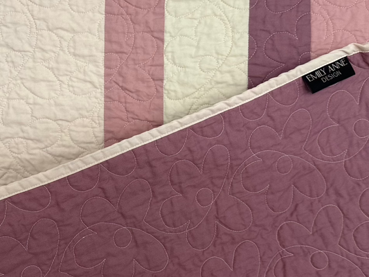 Pink Striped Quilt with Floral Stitching